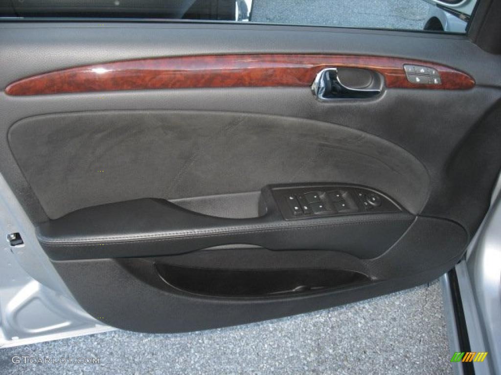 2010 Buick Lucerne CXL Special Edition Ebony Door Panel Photo #39688191