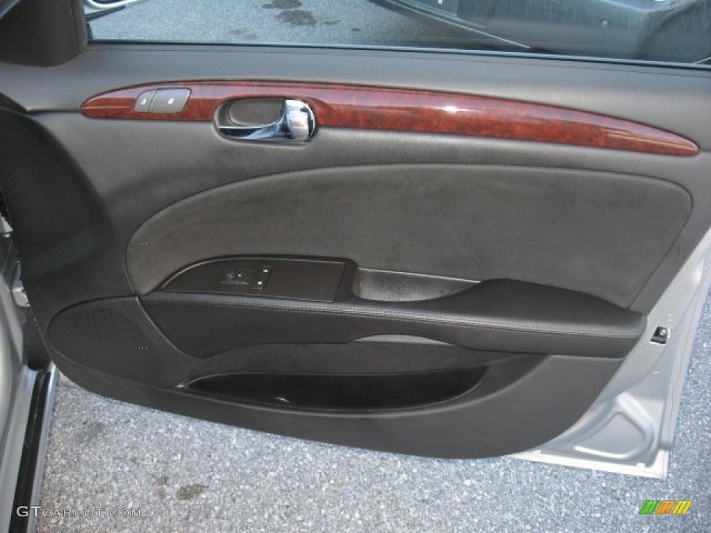 2010 Buick Lucerne CXL Special Edition Ebony Door Panel Photo #39688203