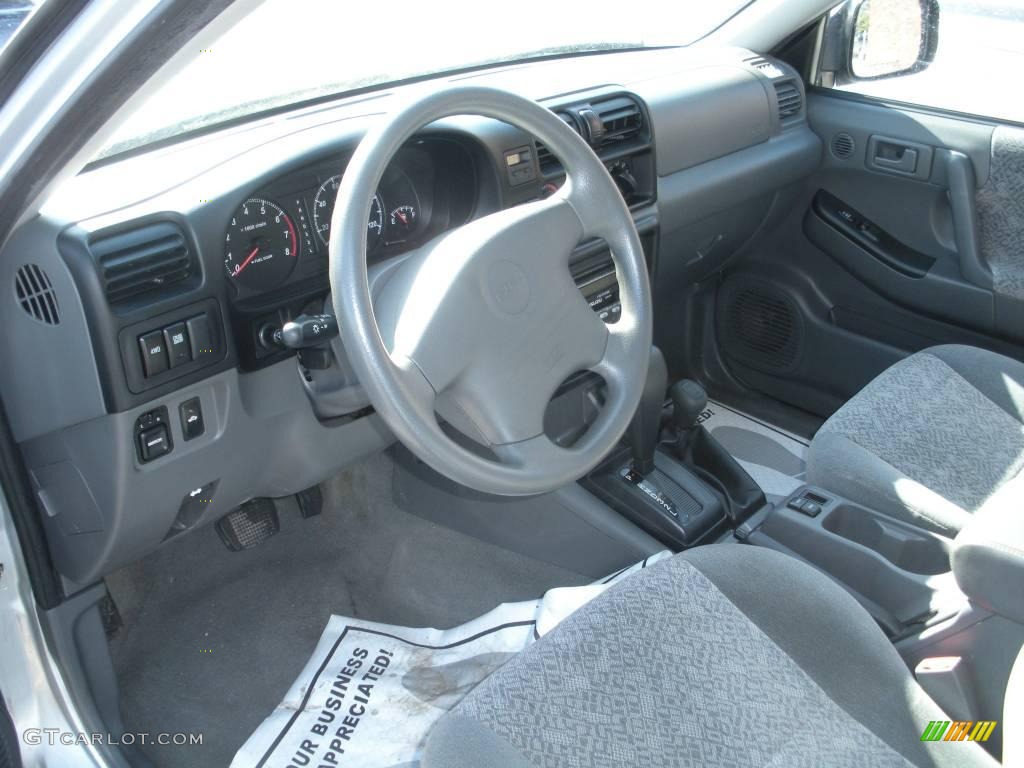 2000 Rodeo LS 4WD - Bright Silver Metallic / Gray photo #13