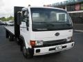White 2006 Nissan Diesel UD 1300 Flat Bed Stake Truck