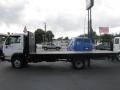 White - UD 1300 Flat Bed Stake Truck Photo No. 4