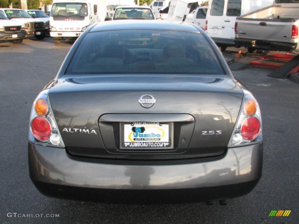 2004 Nissan altima white smoke