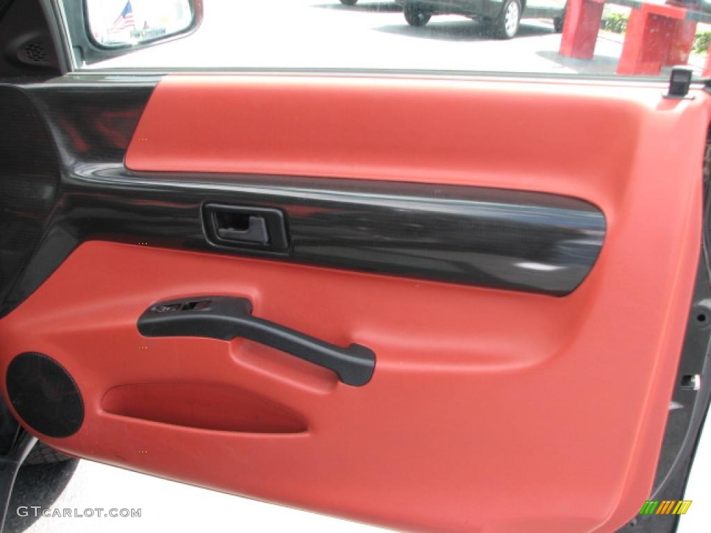 1999 Isuzu VehiCROSS Standard VehiCROSS Model Carbon Black/Martian Rock Red Door Panel Photo #39800260