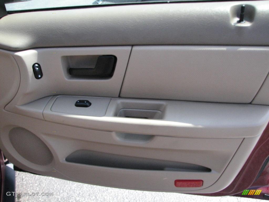 2004 Ford Taurus LX Sedan Medium Parchment Door Panel Photo #39800592