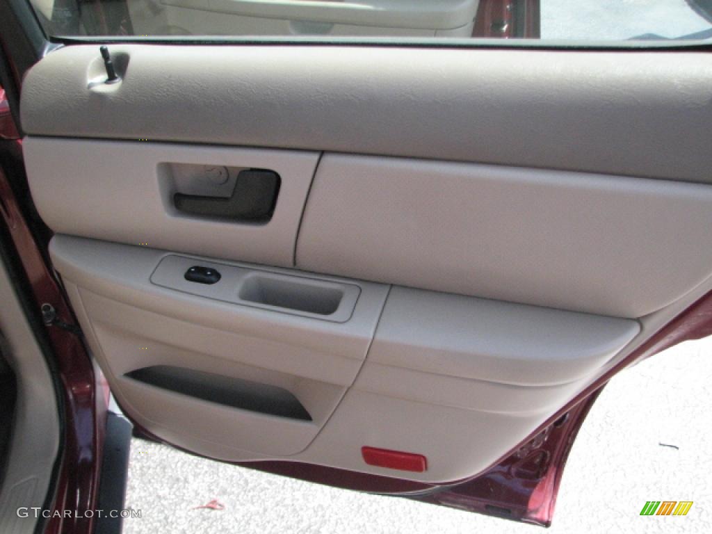 2004 Ford Taurus LX Sedan Medium Parchment Door Panel Photo #39800648