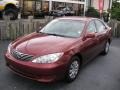 2006 Salsa Red Pearl Toyota Camry LE  photo #5