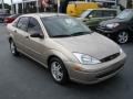 2000 Fort Knox Gold Metallic Ford Focus SE Sedan  photo #1