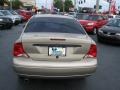 2000 Fort Knox Gold Metallic Ford Focus SE Sedan  photo #8