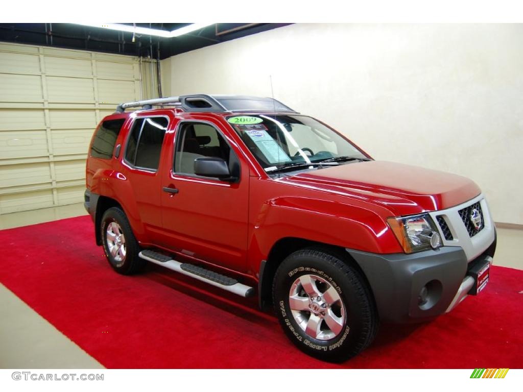 2009 Xterra X - Red Brick / Graphite/Steel photo #1