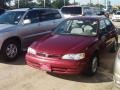 Venetian Red Pearl 2000 Toyota Corolla VE