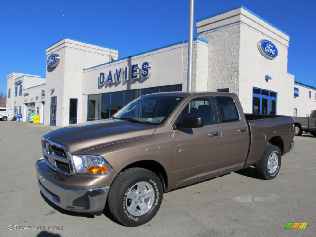 2009 Ram 1500 SLT Quad Cab 4x4 - Austin Tan Pearl / Light Pebble Beige/Bark Brown photo #1