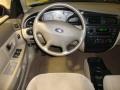 Medium Parchment 2001 Ford Taurus LX Steering Wheel