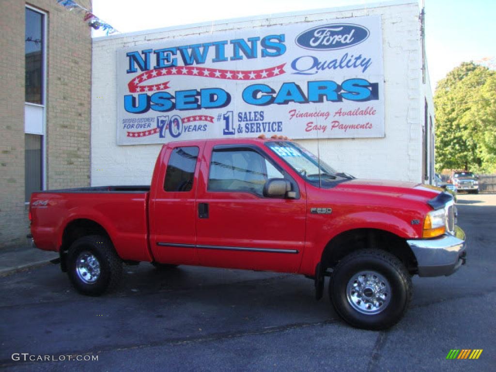 2000 F250 Super Duty XLT Extended Cab 4x4 - Red / Medium Graphite photo #1