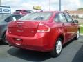 2009 Sangria Red Metallic Ford Focus SE Sedan  photo #2