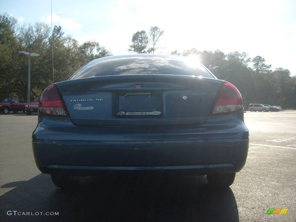 2004 Taurus SE Sedan - True Blue Metallic / Medium Graphite photo #4