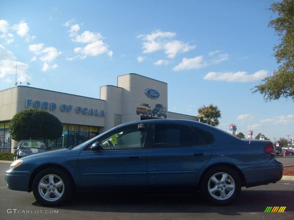 2004 Taurus SE Sedan - True Blue Metallic / Medium Graphite photo #6