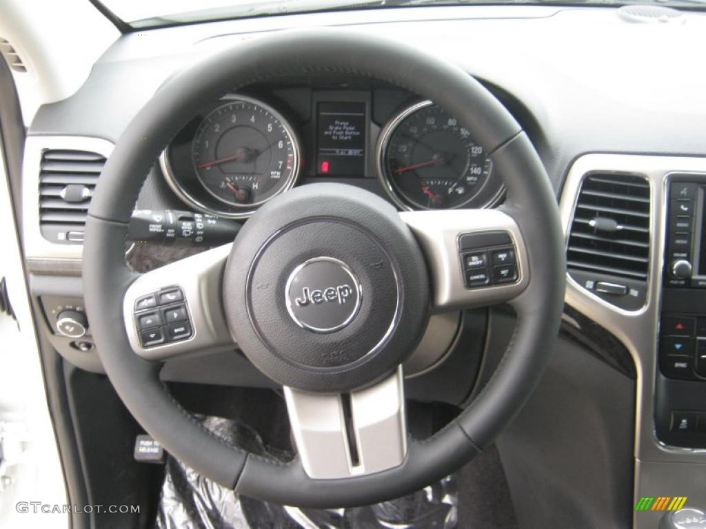 2011 Jeep Grand Cherokee Laredo X Package Black Steering Wheel Photo #39899743