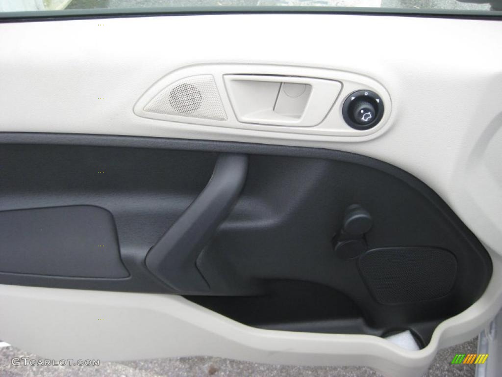 2011 Ford Fiesta S Sedan Light Stone/Charcoal Black Cloth Door Panel Photo #39937332