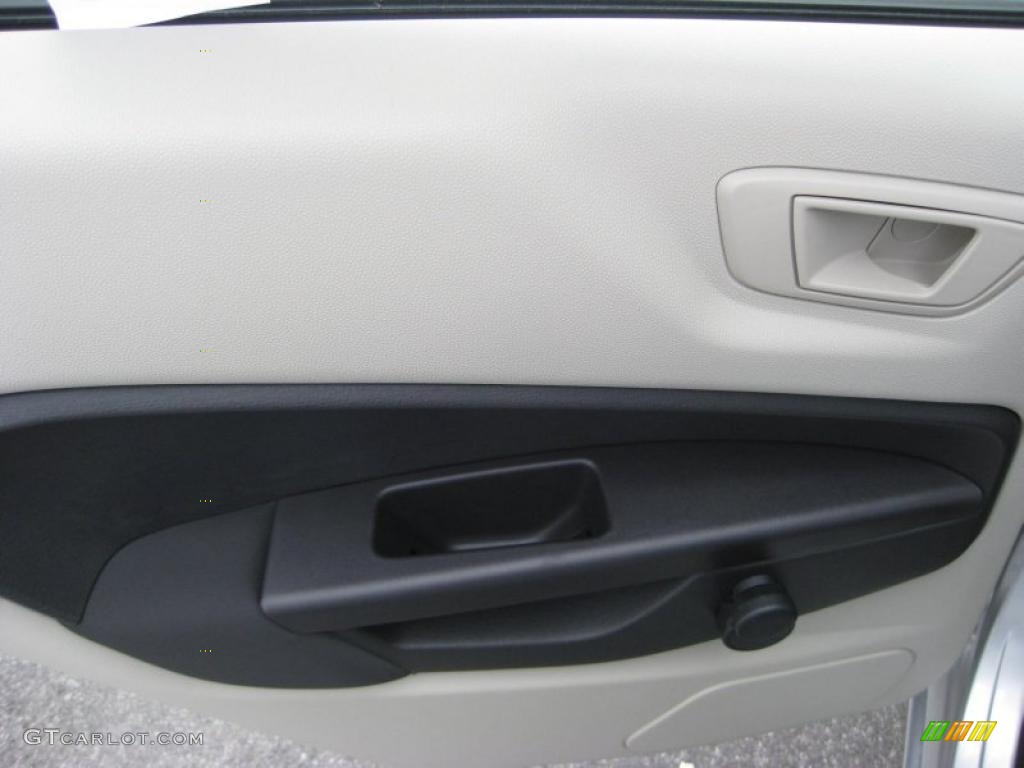 2011 Ford Fiesta S Sedan Light Stone/Charcoal Black Cloth Door Panel Photo #39937380