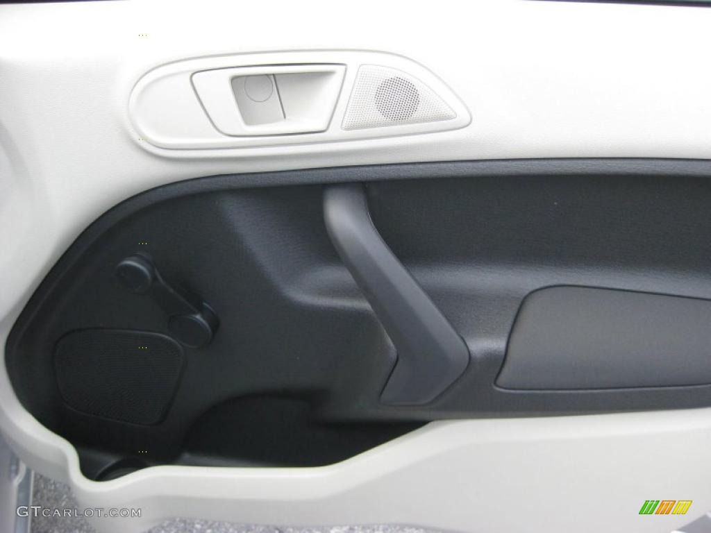2011 Ford Fiesta S Sedan Light Stone/Charcoal Black Cloth Door Panel Photo #39937420