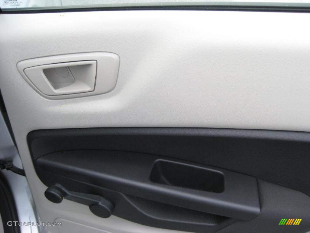 2011 Ford Fiesta S Sedan Light Stone/Charcoal Black Cloth Door Panel Photo #39937464