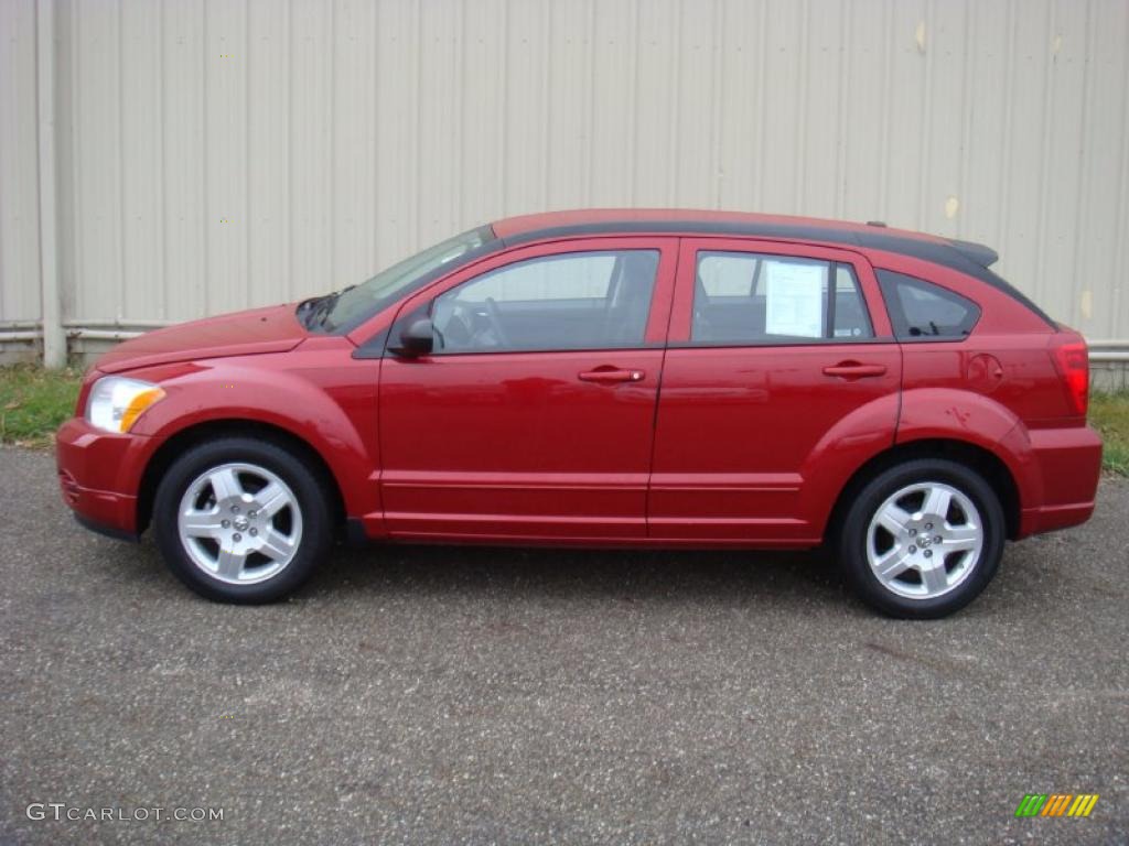 2009 Caliber SXT - Inferno Red Crystal Pearl / Dark Slate Gray photo #2