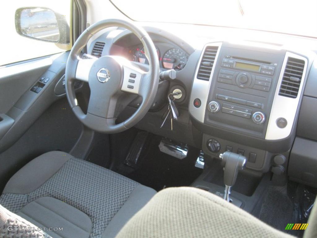 2010 Nissan Frontier SE V6 King Cab 4x4 Graphite Dashboard Photo #40103215