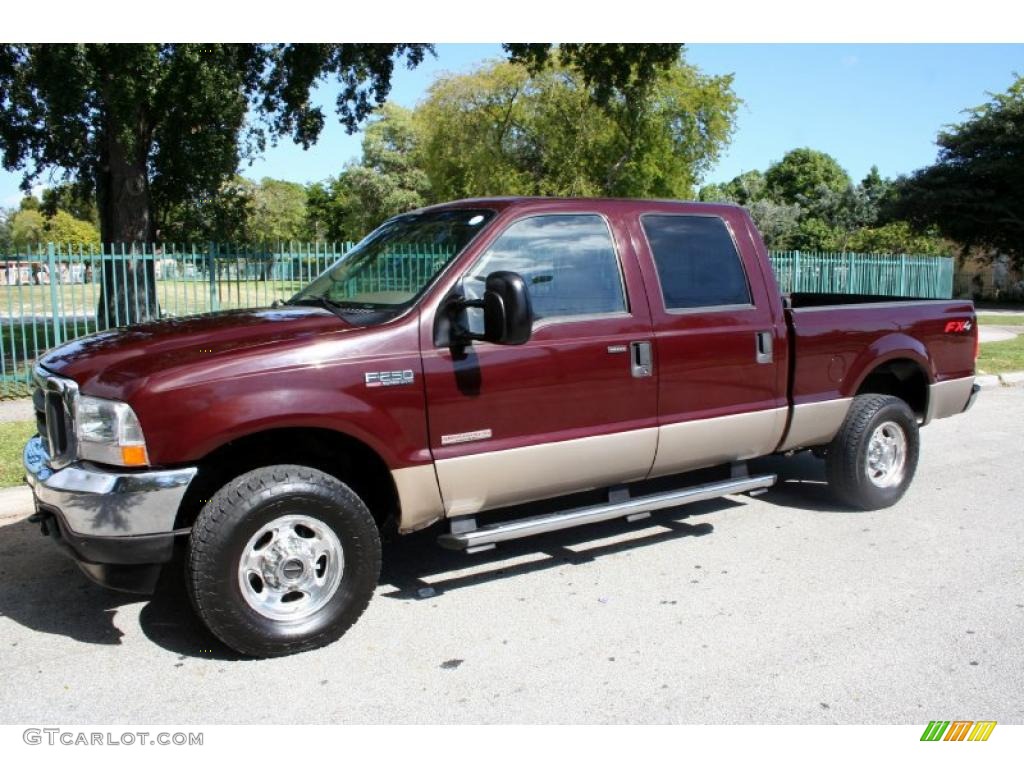 2004 F250 Super Duty Lariat Crew Cab 4x4 - Dark Toreador Red Metallic / Medium Parchment photo #2