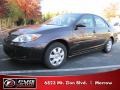 2002 Black Toyota Camry LE  photo #1