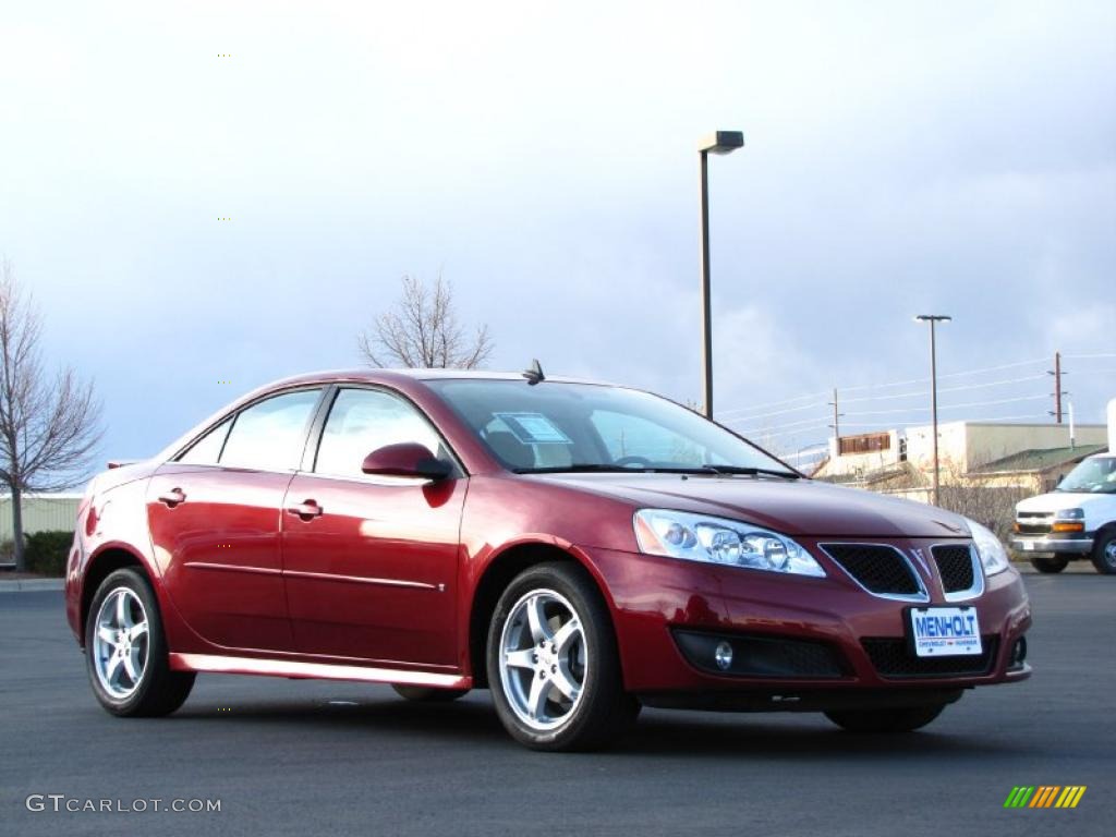 2009 G6 V6 Sedan - Performance Red Metallic / Ebony/Light Titanium photo #2