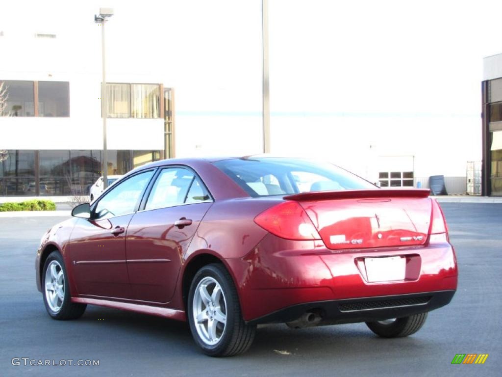 2009 G6 V6 Sedan - Performance Red Metallic / Ebony/Light Titanium photo #12