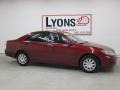 2005 Salsa Red Pearl Toyota Camry LE  photo #33