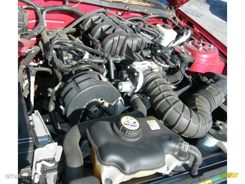2005 Mustang V6 Premium Coupe - Redfire Metallic / Medium Parchment photo #23
