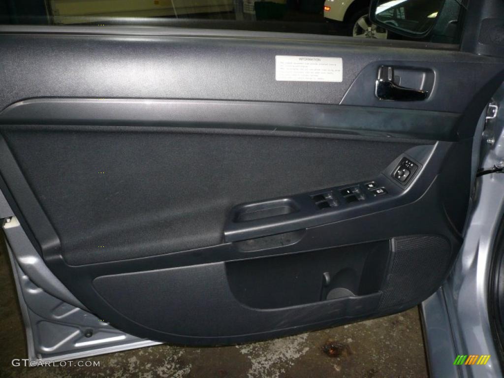 2008 Mitsubishi Lancer Evolution GSR Black Door Panel Photo #40256322