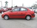 Tropical Red - Rio LX Sedan Photo No. 8
