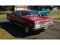 Red 1965 Chevrolet El Camino 