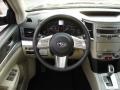Warm Ivory 2010 Subaru Outback 2.5i Premium Wagon Steering Wheel
