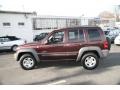 2004 Deep Molten Red Pearl Jeep Liberty Sport 4x4  photo #9