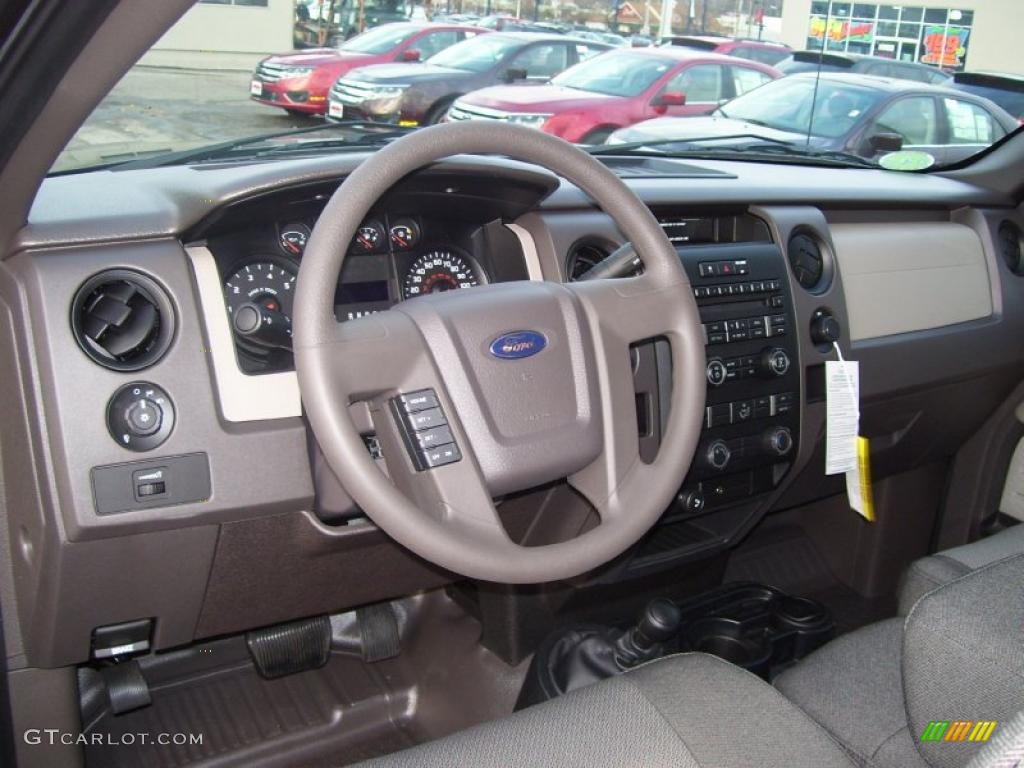 2010 F150 STX SuperCab 4x4 - Tuxedo Black / Medium Stone photo #19