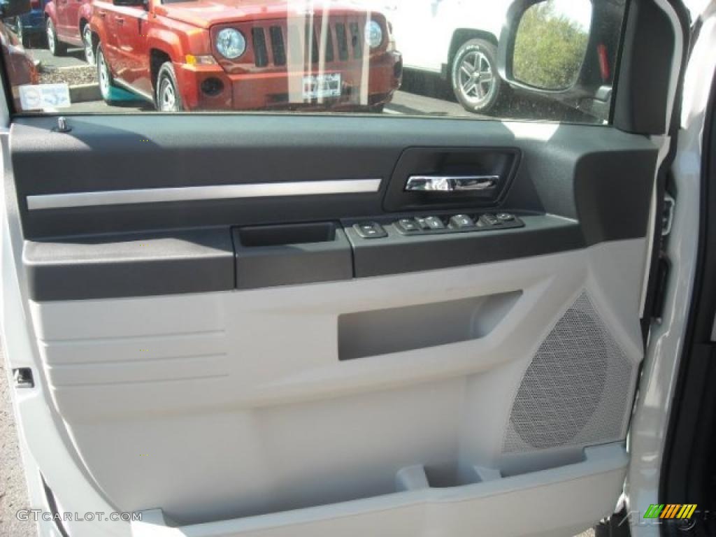2010 Dodge Grand Caravan C/V Dark Slate Gray/Light Shale Door Panel Photo #40448189