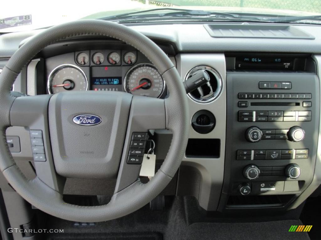 2010 F150 XLT SuperCrew - Tuxedo Black / Medium Stone photo #24