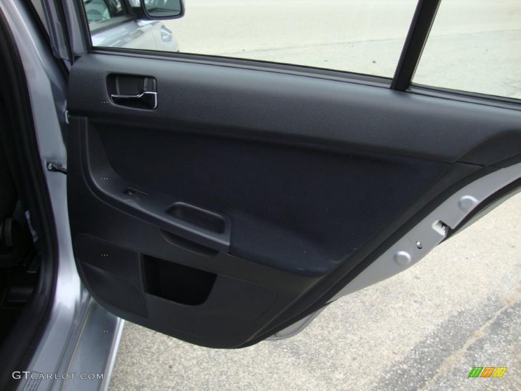 2008 Mitsubishi Lancer Evolution GSR Black Door Panel Photo #40494670