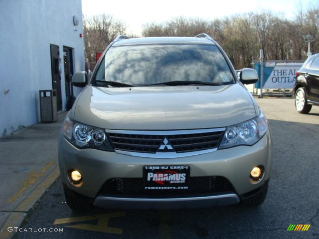 2009 Outlander XLS 4WD - Desert Sand Beige Metallic / Beige photo #2