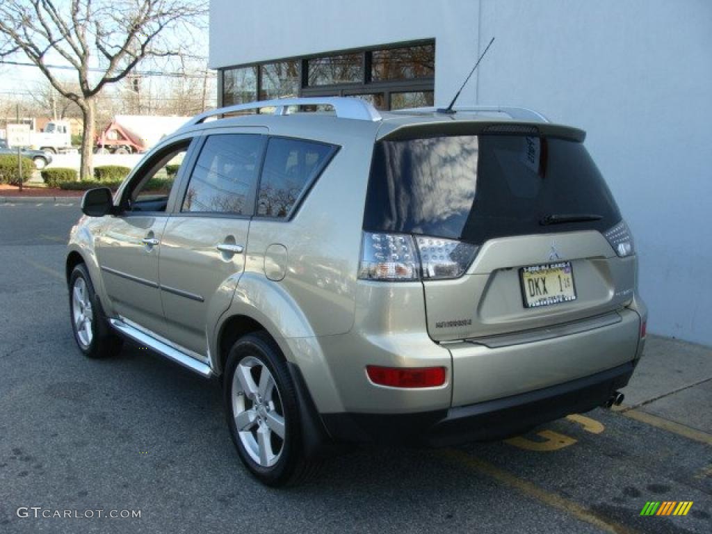 2009 Outlander XLS 4WD - Desert Sand Beige Metallic / Beige photo #4