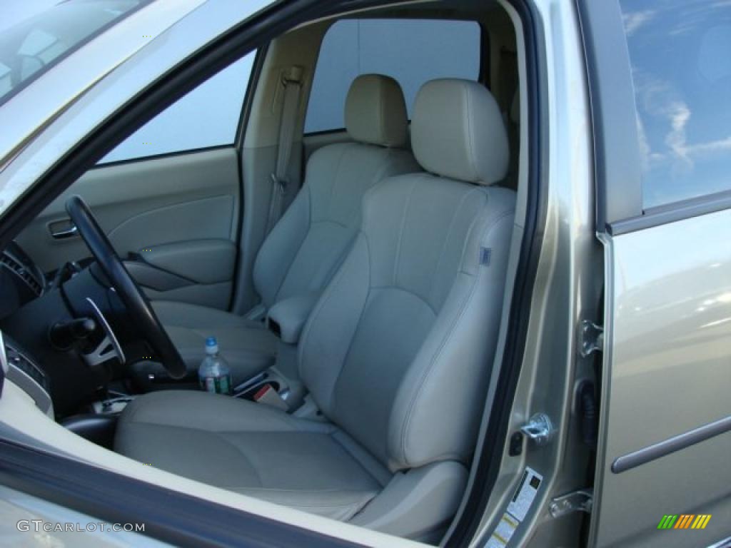 2009 Outlander XLS 4WD - Desert Sand Beige Metallic / Beige photo #10