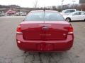 2011 Sangria Red Metallic Ford Focus SE Sedan  photo #3