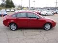 2011 Sangria Red Metallic Ford Focus SE Sedan  photo #5