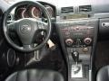 Black 2006 Mazda MAZDA3 s Grand Touring Hatchback Dashboard