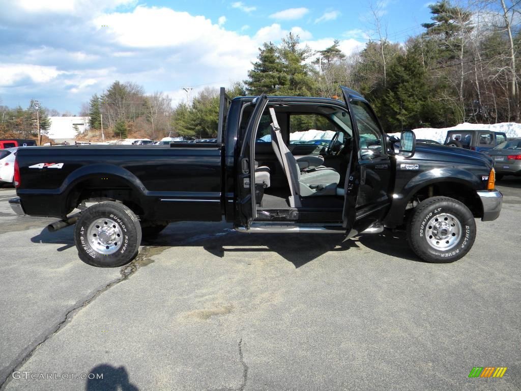 Black 1999 Ford F250 Super Duty XLT Extended Cab 4x4 Exterior Photo #40597313