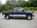 2001 True Blue Metallic Ford F250 Super Duty XLT SuperCab 4x4  photo #13